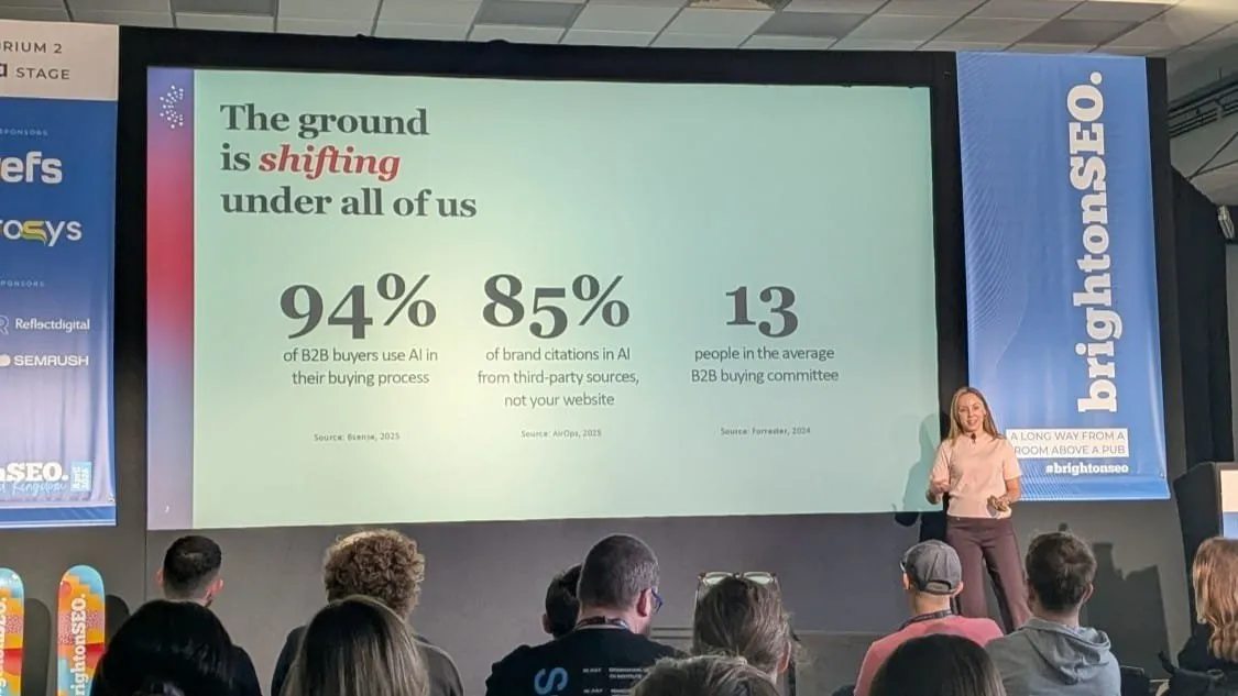 A brightonSEO 2026 slide: 94% of B2B buyers use AI in their buying process, 85% of brand citations in AI come from third-party sources, and the average B2B buying committee has 13 people