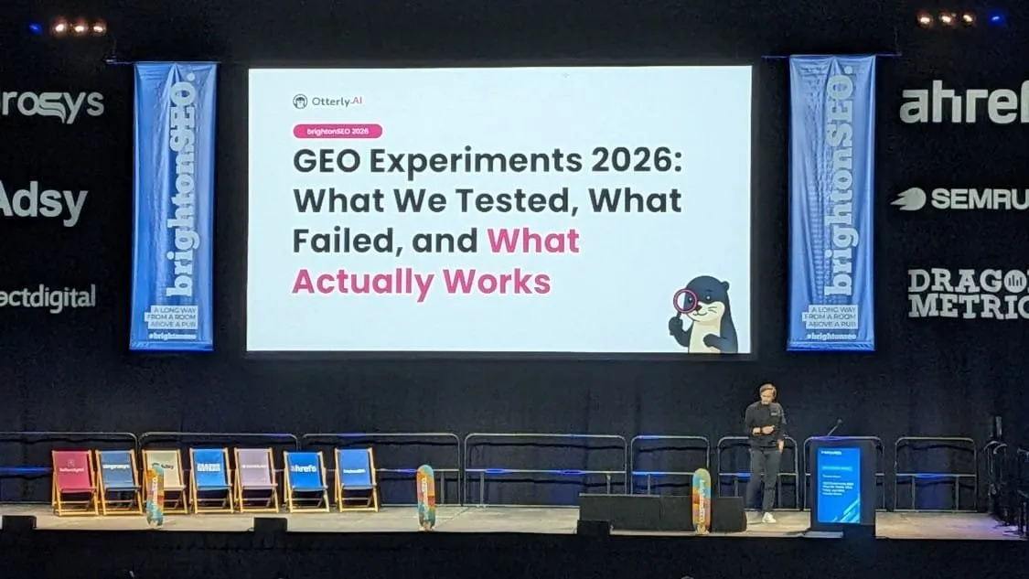 Thomas Peham of Otterly AI on stage, presenting “GEO Experiments 2026: What We Tested, What Failed, and What Actually Works”